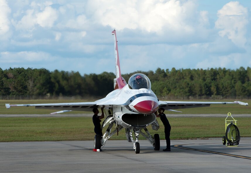 U.S. Air Force Thunderbird maintainers perform preflight checks during Thunder Over South Georgia, Nov. 7, 2015 at Moody Air Force Base, Ga. There were approximately 50,000 people who attended the open house to see acts like the Thunderbirds perform. (U.S. Air Force photo/Tech. Sgt. Zachary Wolf)