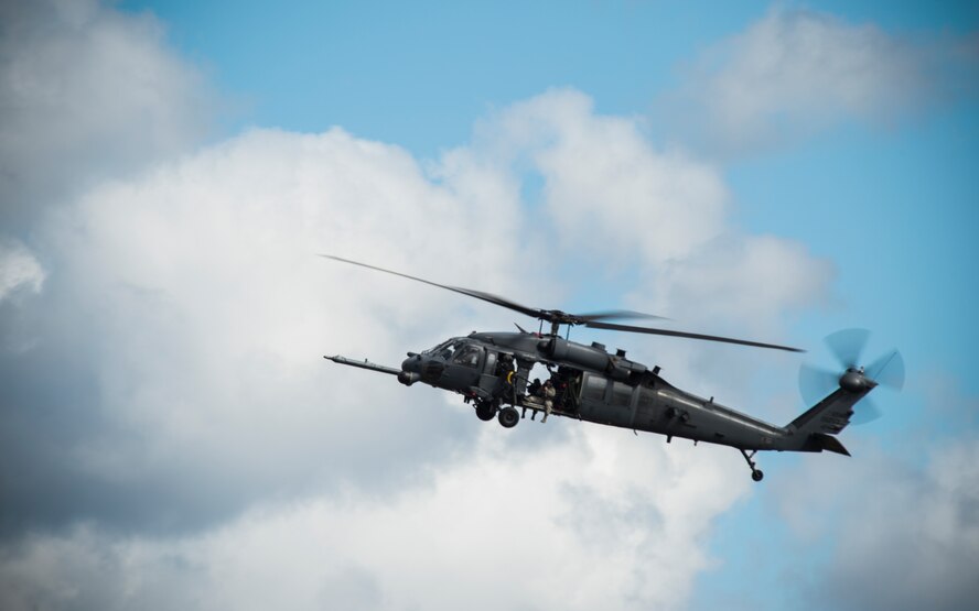An HH-60G Pave Hawk participates in a combat search and rescue demonstration during the Thunder Over South Georgia Open House Nov. 7, 2015, at Moody Air Force Base, Ga. The HH-60’s primary mission is to conduct personnel recovery operations in hostile environments during war. (U.S. Air Force photo by Senior Airman Olivia Dominique/Released)