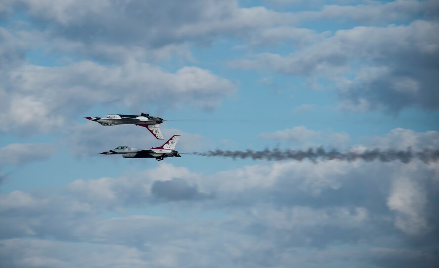Members of the U.S. Air Force Thunderbirds perform an aerial demonstration during Thunder Over South Georgia Open House Nov. 7, 2015, at Moody Air Force Base, Ga. The Thunderbirds showcased their capabilities in front of a crowd of approximately 50,000 spectators. (U.S. Air Force photo by Senior Airman Olivia Dominique/Released)
