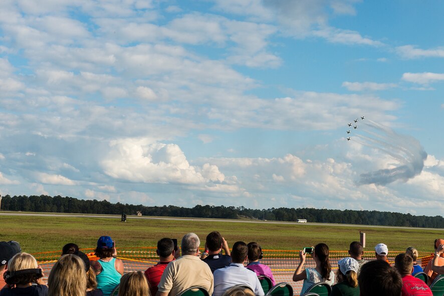 Spectators watch the U.S. Air Force Thunderbirds perform an aerial demonstration during the Thunder Over South Georgia Open House, Nov. 7, 2015, at Moody Air Force Base, Ga. The Thunderbirds showcased their capabilities in front of a crowd of approximately 50,000 spectators. (U.S. Air Force photo by Senior Airman Ceaira Tinsley/Released)