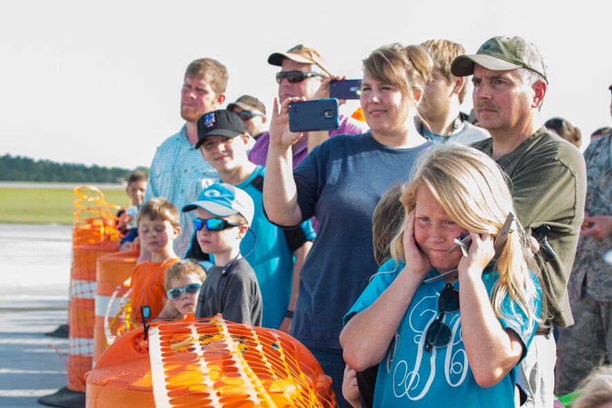 Guests in attendance look on in anticipation before the U.S. Air Force Thunderbirds perform during the Thunder Over South Georgia Open House, Nov. 7, 2015, at Moody Air Force Base, Ga. Approximately 50,000 people attended this year’s open house. (U.S. Air Force photo by Senior Airman Ceaira Tinsley/Released)