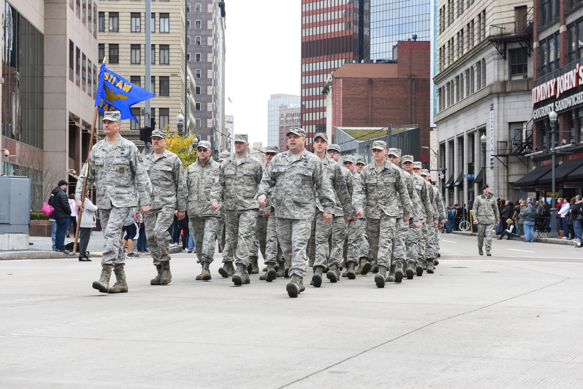 Lt. Col. Todd McCrann, Troop Commander, marches Airmen from the 911th Airlift Wing during the Steel City Salute the Troops parade, in downtown Pittsburgh, Nov. 7, 2015. Military members from local stations around the Pittsburgh area participated in the parade and a variety of events at the Point State Park afterwards, in honor of Veterans Day. (U.S. Air Force photo by Staff Sgt. Justyne Obeldobel)