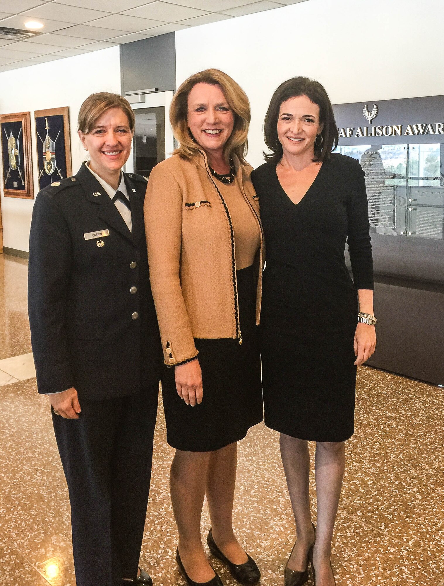 Lt. Col. Erika Cashin, 934th Airlift Wing process manager stands with Secretary of the Air Force Deborah Lee James and Facebook Chief Operating Officer Sheryl Sandberg at the Corona Conference at the Air Force Academy Nov. 6. 
Sandberg briefed briefed James, Gen. Mark Welsh III, Air Force chief of staff, and Air Force commanders on the nature of bias, and on the Secretary of Defense's Lean In directive.
Cashin is the leader of the first Lean In circle within the DoD, and is now running the DoD Lean In Military Chapter at LeanIn.org. (Courtesy Photo)
