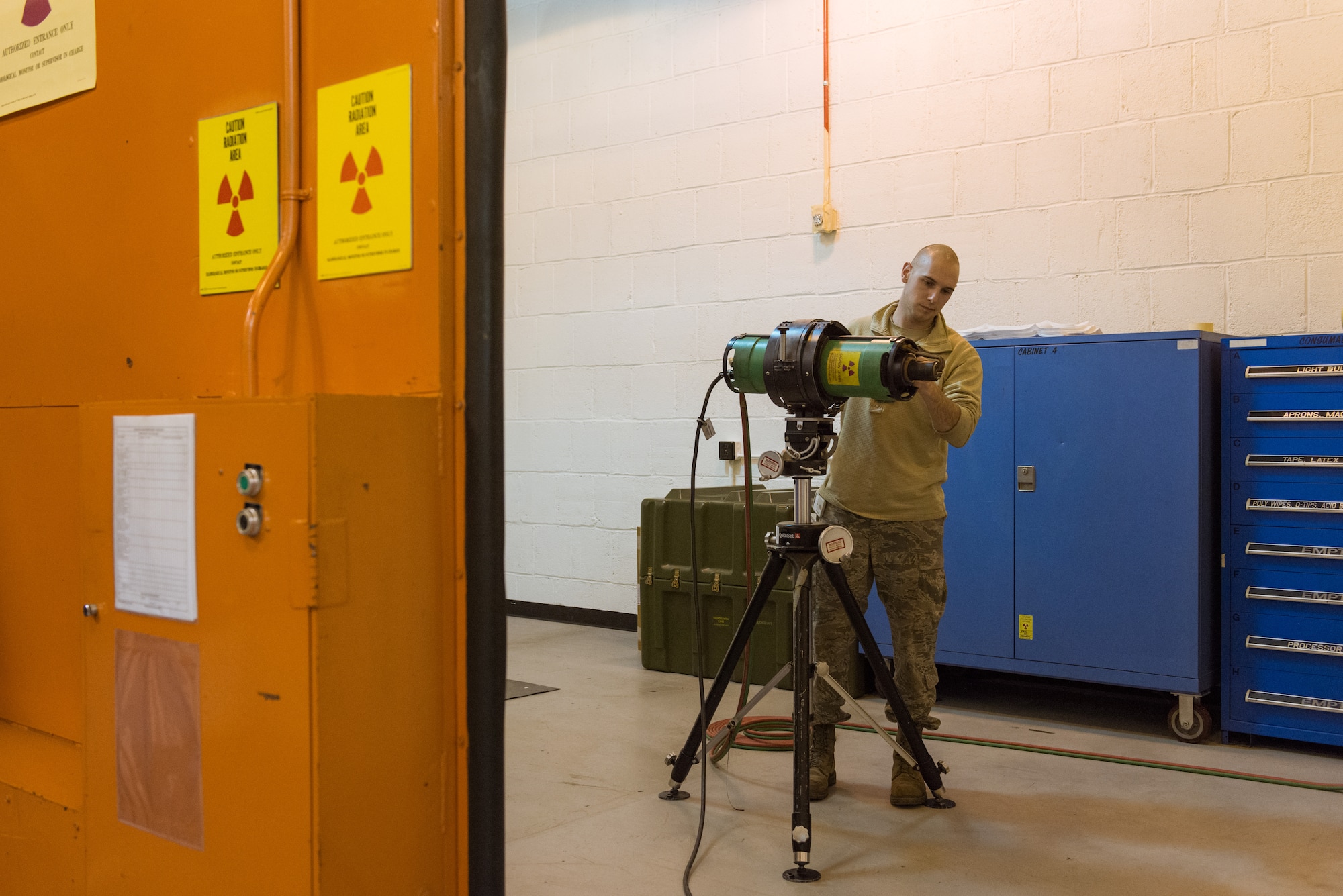 Staff Sgt. Ryan Bauman assembles an x-ray tube head, Nov. 7. (U.S. Air Force photo by Staff Sgt. Trevor Saylor)