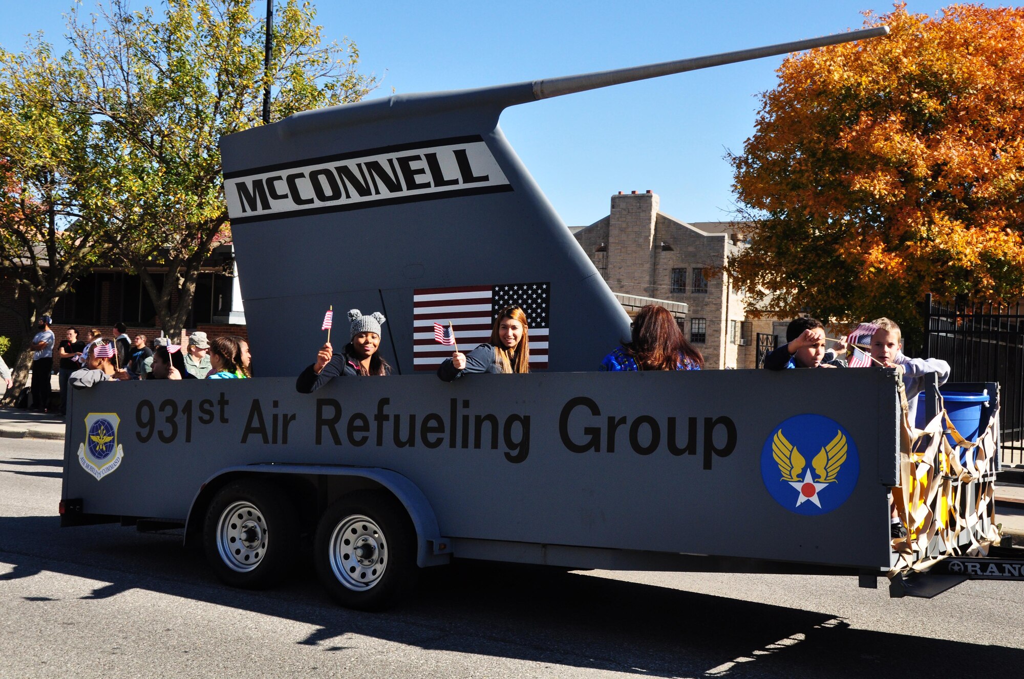 Several members of Team McConnell participated in the 2015 Veterans Day Parade in downtown Wichita, Kan., Nov. 8, 2015.  The Total force representation from the active duty 22nd Air Refueling Wing and the Reserve 931st Air Refueling Group took part in the parade as a way to honor U.S. military veterans.  (U.S. Air Force photo by Tech. Sgt. Abigail Klein)
