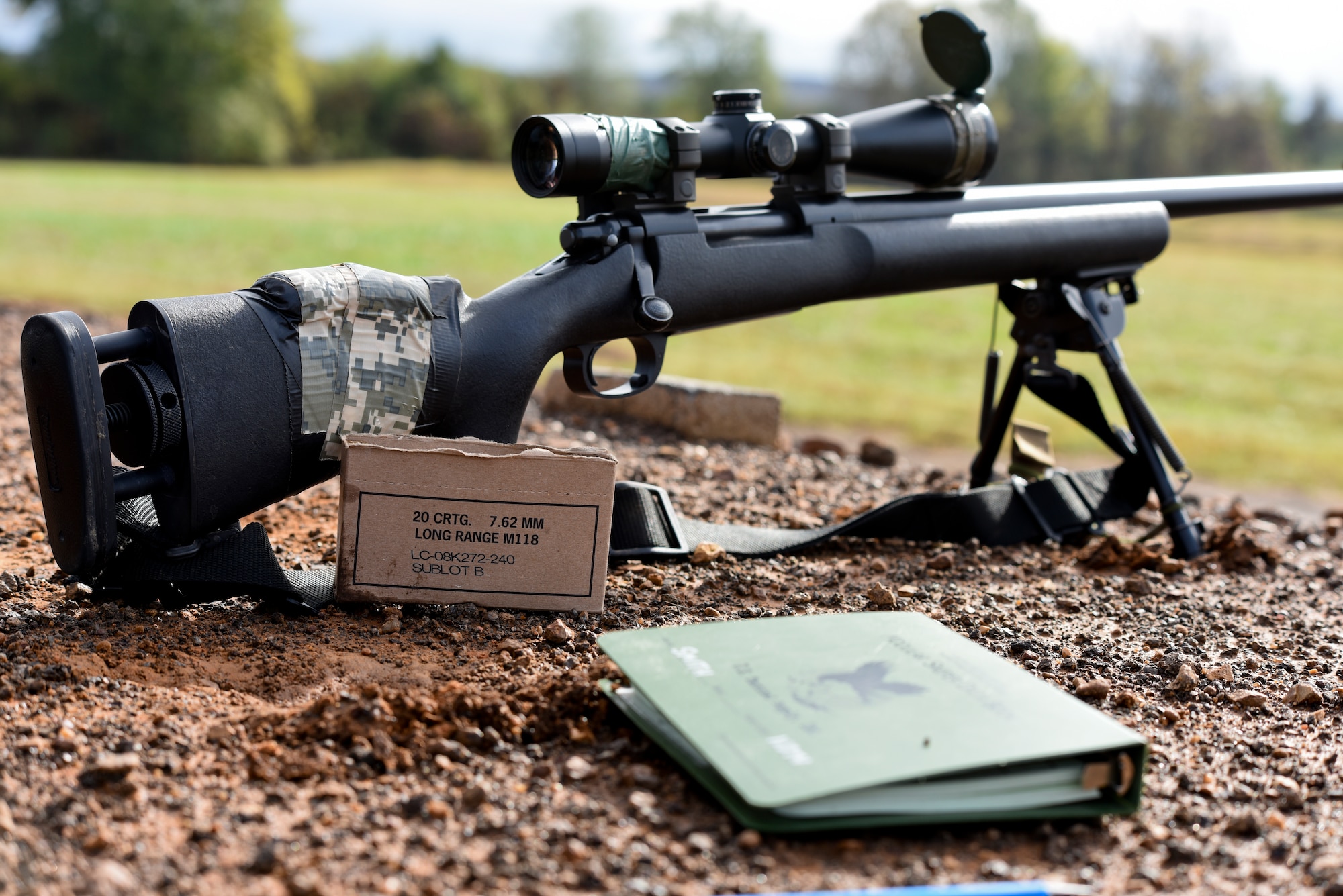 188th Security Forces members complete known distance sniper and advanced designated marksman qualification Nov. 6, 2015 at Fort Chaffee Joint Maneuver Training Center, Ark. The 188th SFS maintains combat readiness and efficiency through annual training on their designated weapons systems which allows them to remain proficient as marksmen. The training consisted of qualifications at 100, 300, 400, and 500 yards and with moving targets at designated distances. (U.S. Air National Guard photo by Capt. Holli Nelson)