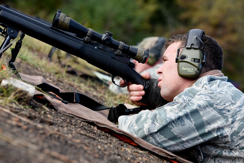 Senior Airman Evan Davis of the 188th Security Forces Squadron, looks down the sights of his M-24 rifle Nov. 6, 2015 during known distance sniper and advanced designated marksman qualification at Fort Chaffee Joint Maneuver Training Center, Ark. The 188th SFS maintains combat readiness and efficiency through annual training on their designated weapons systems which allows them to remain proficient as marksmen. The training consisted of qualifications at 100, 300, 400, and 500 yards and with moving targets at designated distances. (U.S. Air National Guard photo by Capt. Holli Nelson)
