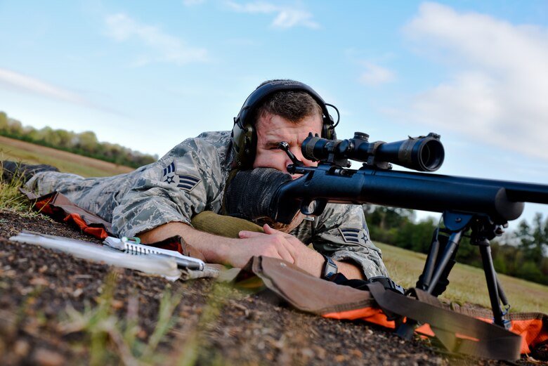 Senior Airman Evan Davis of the 188th Security Forces Squadron, looks down the sights of his M-24 rifle to zero his target Nov. 6, 2015 during known distance sniper and advanced designated marksman qualification at Fort Chaffee Joint Maneuver Training Center, Ark. 188th SFS members qualified on the M-24 rifle at designated distances of 100, 300, 400 and 500 yards and with moving targets to maintain combat readiness and efficiency as marksmen. (U.S. Air National Guard photo by Capt. Holli Nelson)