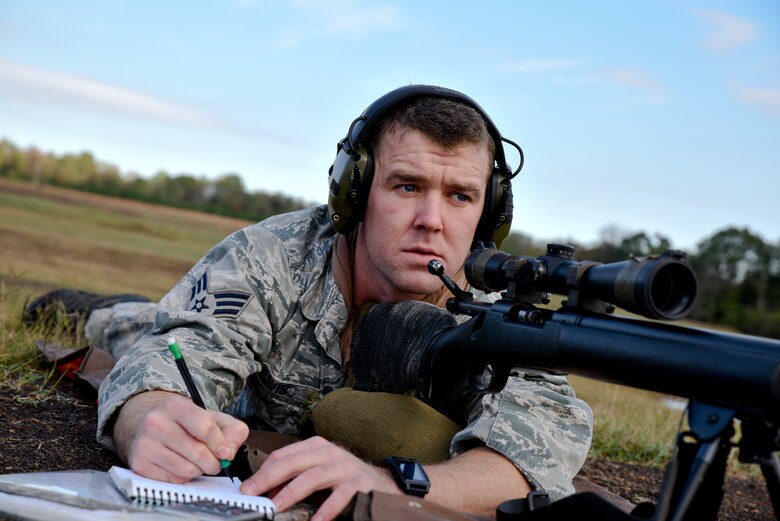 Senior Airman Evan Davis of the 188th Security Forces Squadron, records data of his previous shot Nov. 6, 2015 during known distance sniper and advanced designated marksman qualification at Fort Chaffee Joint Maneuver Training Center, Ark. 188th SFS members qualified on the M-24 rifle at designated distances of 100, 300, 400 and 500 yards and with moving targets to maintain combat readiness and efficiency as marksmen. (U.S. Air National Guard photo by Capt. Holli Nelson)
