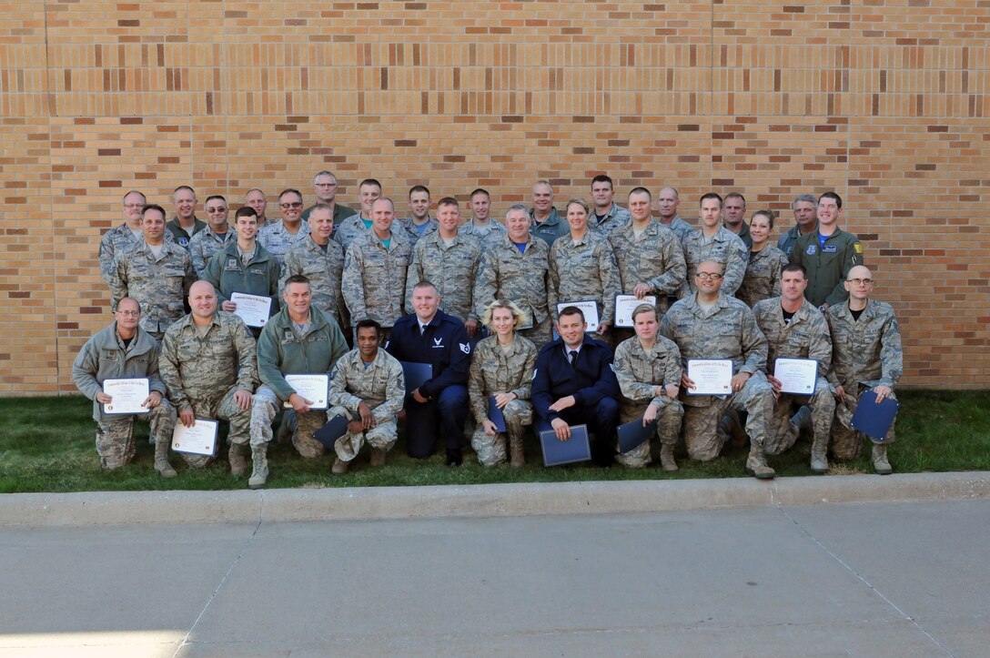 56 members of the 185 Air Refueling Wing, Sioux City, Iowa, received their Community College of the Air Force degrees in a ceremony at the base on Sunday November, 2015.  The CCAF offers associate in applied science degrees that enhance mission readiness, contribute to recruiting, assist in retention and support the career transitions of Air Force enlisted members..  (U.S. Air National Guard photo by Tech Sgt. Bill Wiseman/Released)