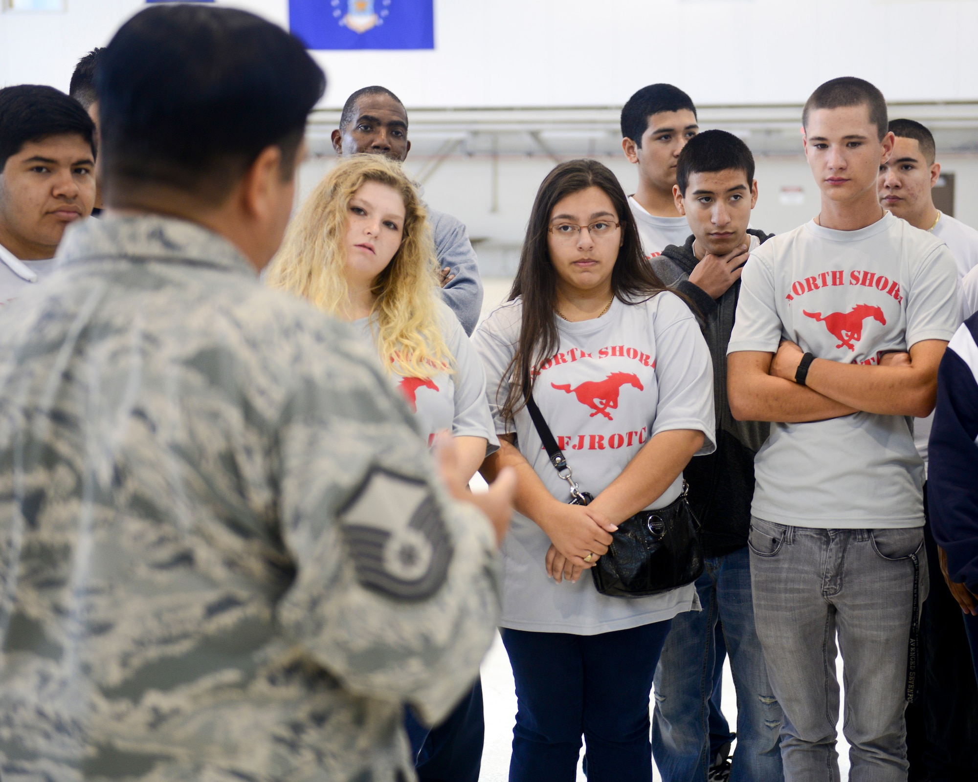 North Shore High School Air Force Junior Reserve Officer Training Corps cadets toured the 147th Reconnaissance Wing at Ellington Field in Houston November 7, 2015. The cadets stopped at the Air Support Operations Squadron to speak with Tactical Air Control Party members and Joint Terminal Attack Controllers about their job as well as the wing's hangar to learn about the MQ-1 Predator.