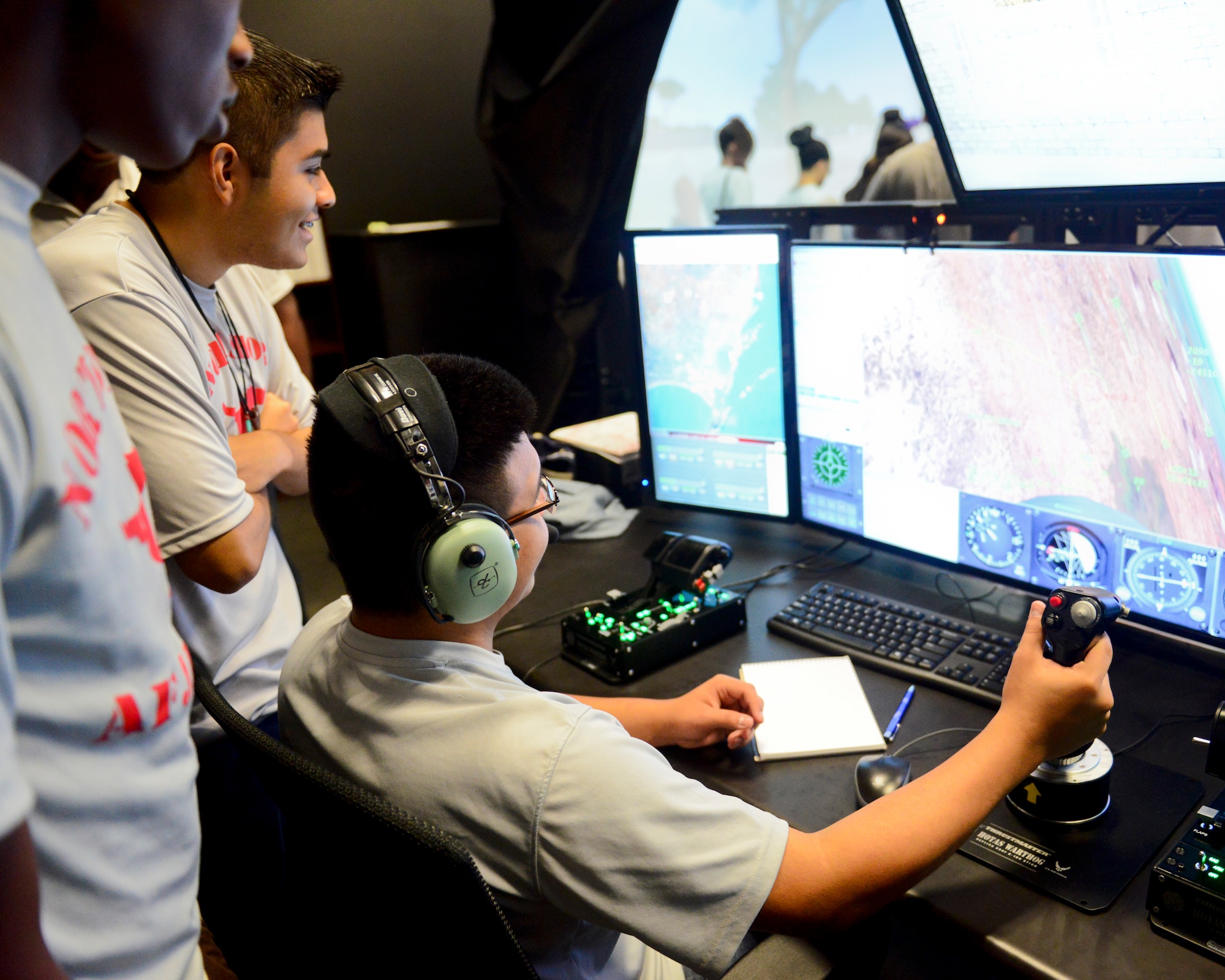 North Shore High School Air Force Junior Reserve Officer Training Corps cadets toured the 147th Reconnaissance Wing at Ellington Field in Houston November 7, 2015. The cadets stopped at the Air Support Operations Squadron to speak with Tactical Air Control Party members and Joint Terminal Attack Controllers about their job as well as fly a virtual airplane and trek through a mock deployment zone in the squadron's new $2 million Air National Guard Advanced Joint Terminal Attack Controller Training System.