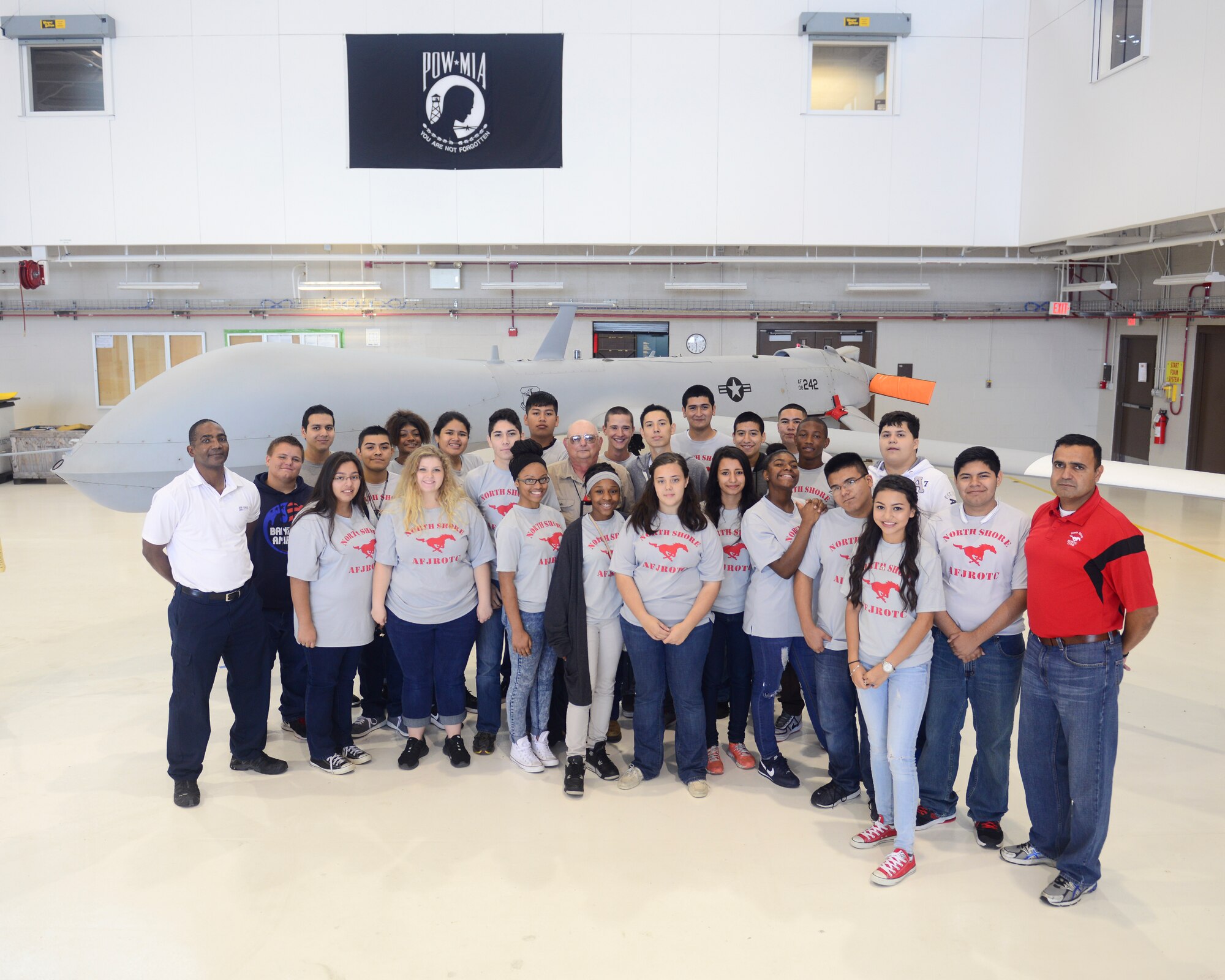 North Shore High School Air Force Junior Reserve Officer Training Corps cadets toured the 147th Reconnaissance Wing at Ellington Field in Houston November 7, 2015. The cadets stopped at the Air Support Operations Squadron to speak with Tactical Air Control Party members and Joint Terminal Attack Controllers about their job as well as the wing's hangar to learn about the MQ-1 Predator.