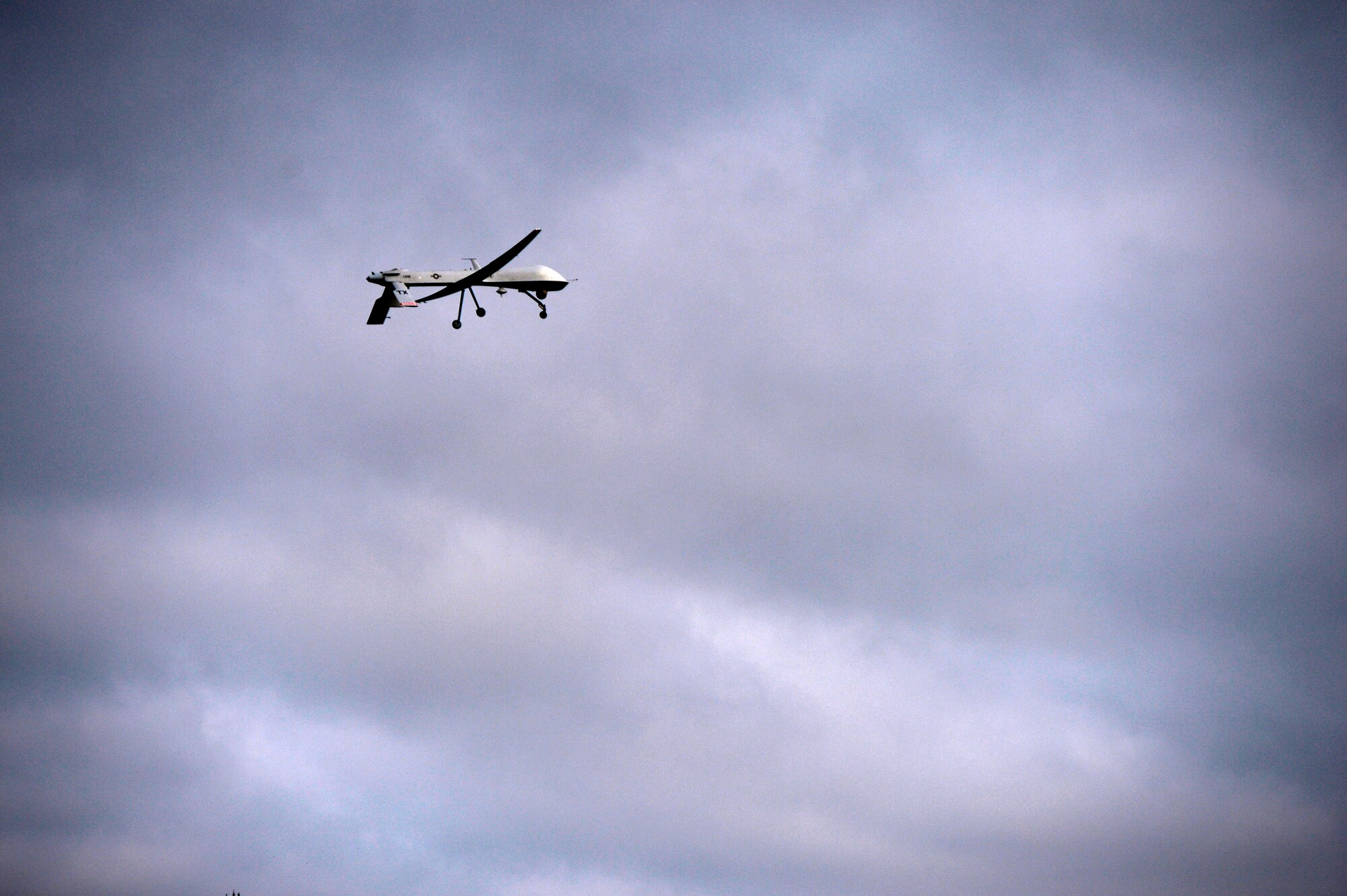 A 147th Reconnaissance Wing, Texas Air National Guard, MQ-1 Predator flies in Latvian airspace Sept. 1, 2015, at Lielvarde Air Base, Latvia. The flight marked the first launch and recover of a large-scale remotely piloted aircraft in Latvia. (Air National Guard photo by 1st Lt. Alicia Lacy)