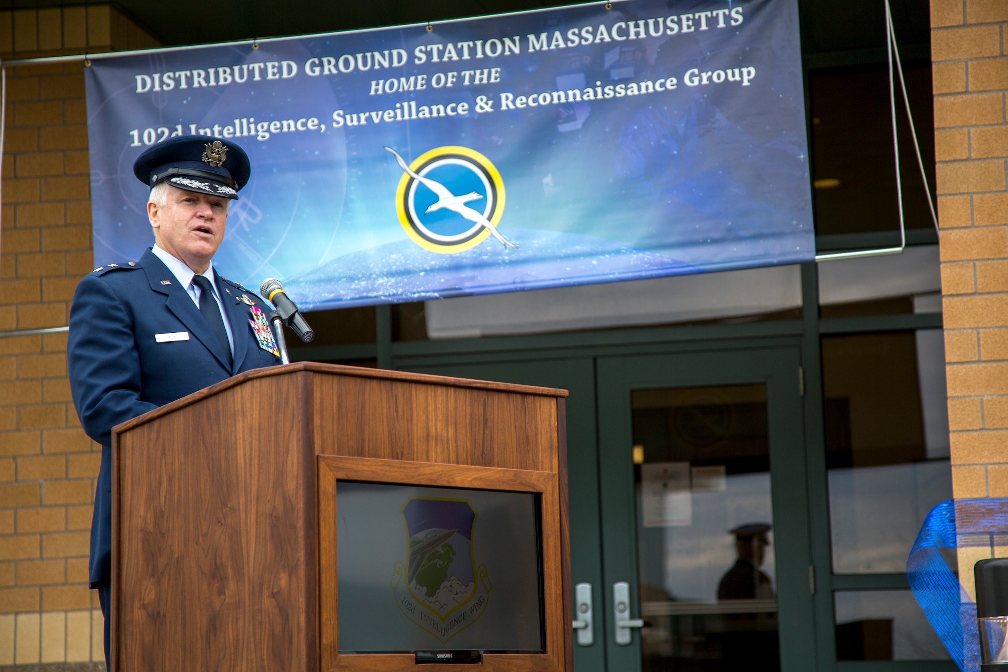 Maj. Gen. Scott L. Rice, The Adjutant General, Massachusetts National Guard, speaks to members and guests of the 102nd at a ribbon-cutting ceremony November 7, 2015 at Otis Air National Guard Base, Massachusetts. The 102nd opened a state-of-the-art intelligence facility as part of its weapon system, the Distributed Common Ground Station. The DCGS has been a part of the Intelligence, Surveillance, and Reconnaissance mission of the 102nd since December 2009. (Air National Guard photo by Staff Sgt. Jeremy Bowcock)