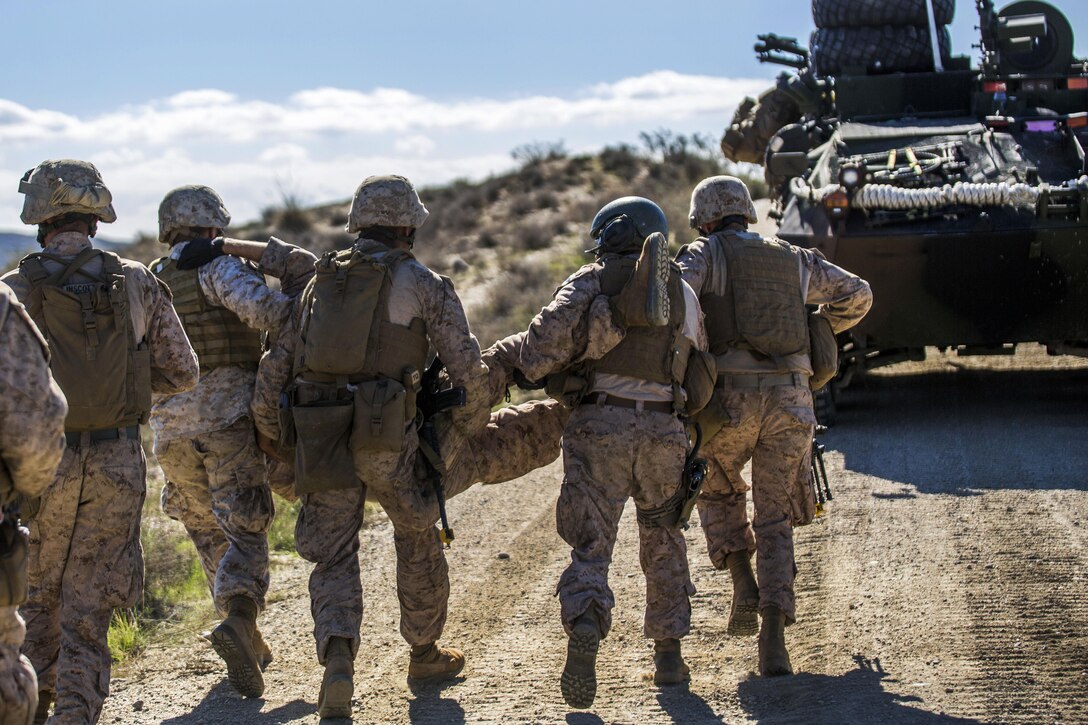U.S. Marines participate in a simulated casualty evacuation during Trident Juncture 2015 in Almeria, Spain, Oct. 31, 2015. U.S. Marine Corps photo by Cpl. Gabrielle Quire