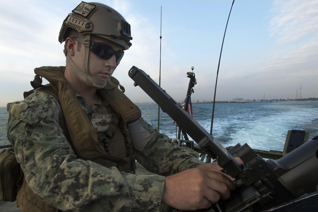 U.S. Navy Petty Officer 3rd Class Matthew Pallandro sets a weapon to condition 3 during patrol operations in the Arabian Gulf, Nov. 2, 2015. Pallandro is a gunner’s mate assigned to commander, Task Group 56.7’s, Riverine Command Boat 805. CTG 56.7 conducts maritime security operations to ensure freedom of movement for strategic shipping and naval vessels operating in the inshore and coastal areas of the U.S. 5th Fleet area of operations. U.S. Navy photo by Petty Officer 2nd Class Torrey W. Lee
