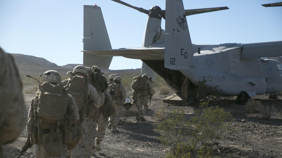 Marines with Bravo Company, 1st Battalion, 8th Marine Regiment, board an MV-22 Osprey after recovering a downed pilot during a tactical recovery of aircraft personnel mission as part of Integrated Training Exercise 1-16 at Marine Air Ground Combat Center, Twentynine Palms, Calif., Nov. 5, 2015. Marines with Bravo Company, 1st Battalion, 8th Marine Regiment, are participating in a wide variety of exercises throughout ITX to prepare for their upcoming deployment with Special Purpose Marine Air-Ground Task Force Crisis Response-Africa. 