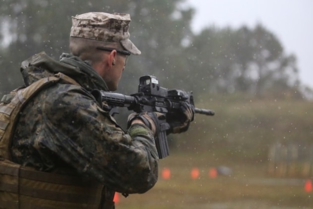 A Marine with 2nd Reconnaissance Battalion takes part in rifle-to-pistol drills during Expeditionary Operations Training Group’s close quarters tactics course at Camp Lejeune, N.C., Nov. 3, 2015. These drills tested the Marine’s ability to switch between the two weapons systems, simulating a malfunction or depleted ammunition. (U.S. Marine Corps photo by Lance Cpl. Miranda Faughn/Released)
