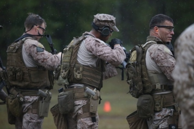 Marines with 2nd Reconnaissance Battalion, “unload, show clear” after a drill during the Expeditionary Operations Group’s close quarters tactics course at Camp Lejeune, N.C., Nov. 3, 2015. During the course, the Marines rehearsed tactics, night time shooting, and close quarter techniques inside of buildings. (U.S. Marine Corps photo Lance Cpl. Miranda Faughn)