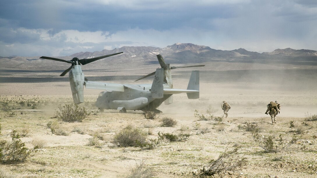 A Marine with Transportation Services Company, Combat Logistics Battalion 2, carries a simulated casualty to an MV-22 Osprey for a medical evacuation during a live-fire vehicle recovery exercise as part of Integrated Training Exercise 1-16 at Marine Air Ground Combat Center Twentynine Palms, Calif., Nov. 4, 2015. The training tested the Marines’ ability to effectively recover a downed vehicle while engaging the enemy in a live-fire scenario. 