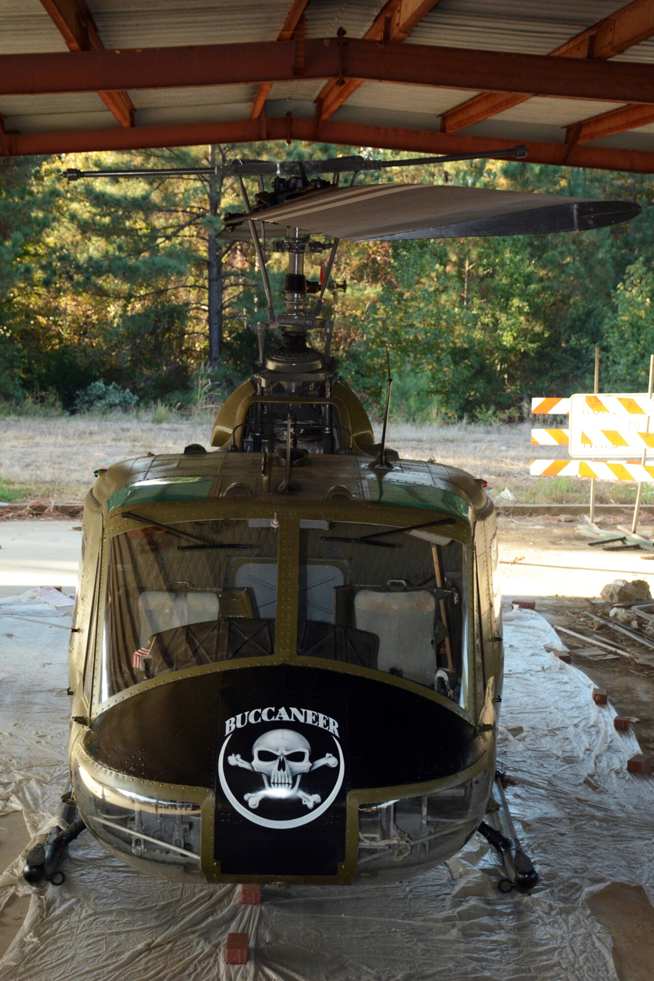 A Bell UH-1C Iroquois helicopter awaits its final decals as part of a restoration project taking place at the Jacksonville Recycling Center in Jacksonville, Ark., Oct. 22, 2015. A group of U.S. Air Force Airmen helped restore the Vietnam era chopper for the Jacksonville Museum of Military History. (U.S. Air Force photo by Master Sgt. Jeff Walston/Released) 