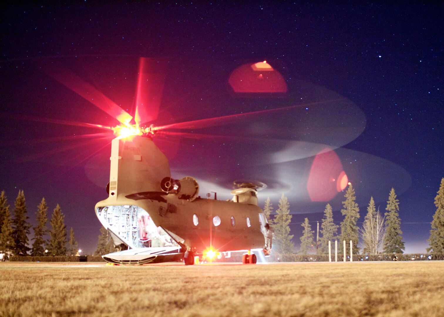 A CH-47F Chinook helicopter crew with the Pennsylvania Army National Guard's B Company, 2nd of the 104th General Support Aviation Battalion prepares for night operations during Exercise Maple Reserve in October 2011. The Pennsylvania National Guard, due to its assets and proximity to the Canadian border, were called on to help the Canadian army with pre-deployment training requirements.
