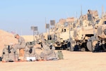 A National Soldier assigned to Able Troop, 2nd Squadron, 183rd Cavalry Regiment of the Virginia Army National Guard, reviews a check list on Contingency Operating Base Adder, Iraq, in preparation for their final convoy out of Iraq, Dec. 2, 2011.