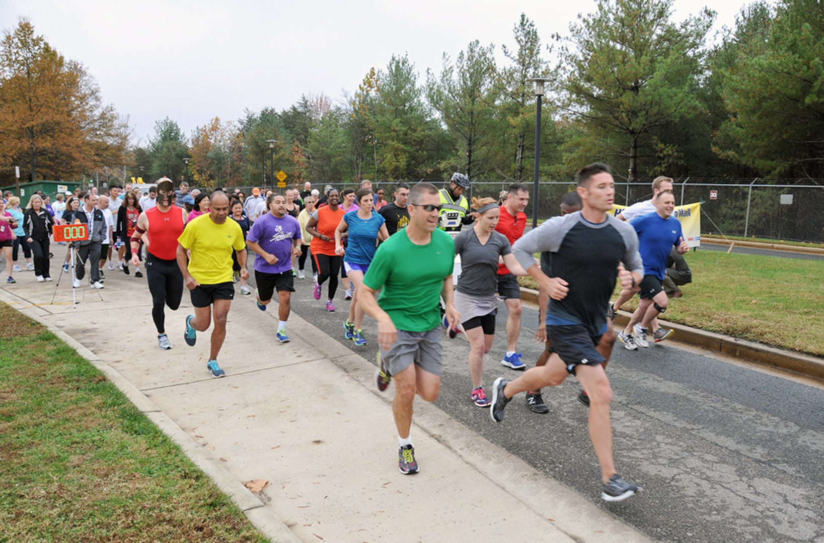 Runners take off from the start line at the HQC Halloween 5K Run/Walk Nov. 5 at the McNamara Headquarters Complex.