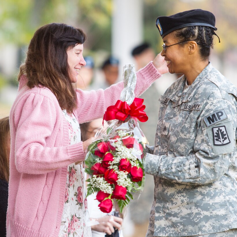 DeMaria Nadig, the wife of outgoing commander Col. Keith P. Nadig, is honored during a change of command ceremony for the 333rd Military Police Brigade Nov. 7, 2015, on Joint Base McGuire-Dix-Lakehurst. (U.S. Army photo by Sgt. Ida Irby/Released)