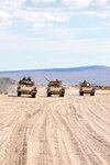 California National Guard Soldiers, of 1st Battalion, 185th Armor (Combined Arms Battalion), operate their Bradley Fighting Vehicles to maneuver in a wedge formation while conducting exercises Nov. 5, 2011, at the National Training Center at Fort Irwin, Calif.