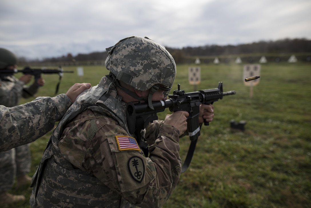 U.S. Army Reserve Soldiers from military police and drill sergeant units fire their rifles at a qualification range during a multi-day training event hosted at Camp Atterbury, Ind., Nov. 6. The 384th Military Police Battalion, headquartered at Fort Wayne, Ind., organized a three-day range and field training exercises involving more than 550 U.S. Army Reserve Soldiers and incorporated eight different weapons systems, combat patrolling and a rifle marksmanship competition at Camp Atterbury, Ind., Nov. 5-7. (U.S. Army photo by Master Sgt. Michel Sauret)