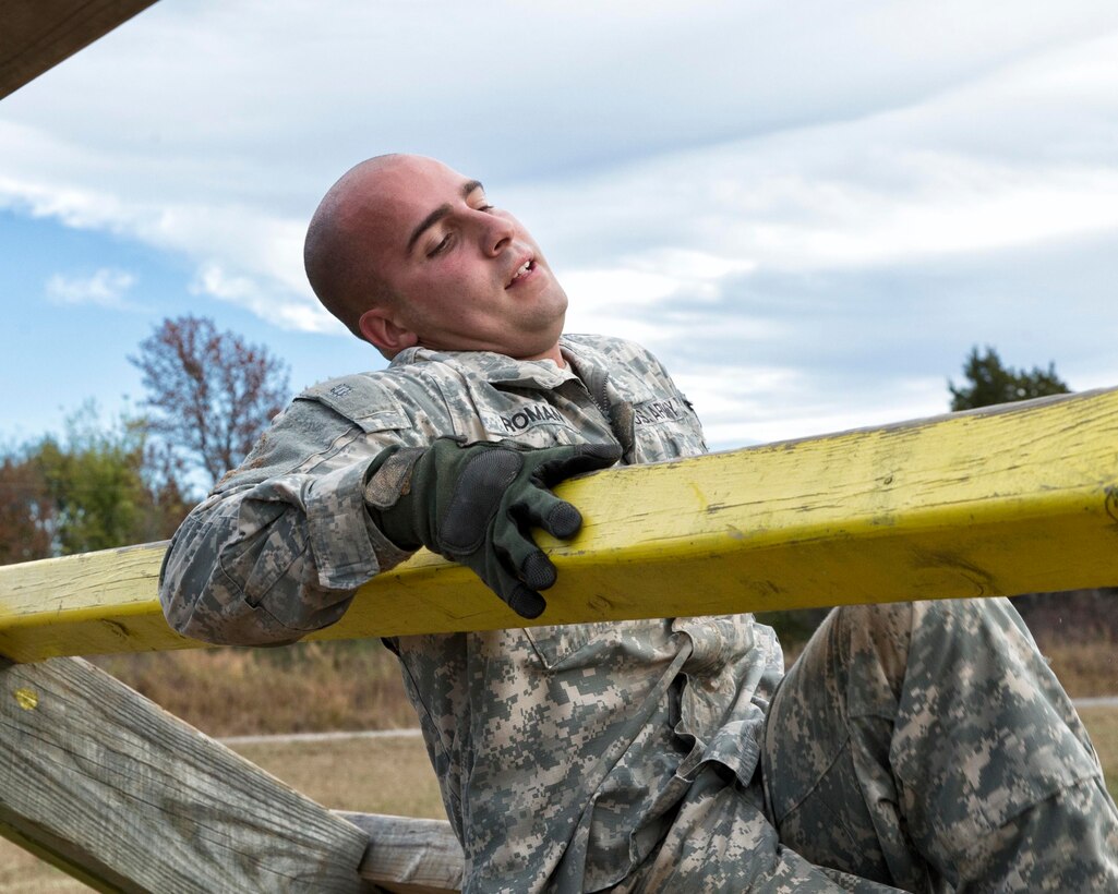 A soldier negotiates one of the nine stations on the obstacle course during the 2015 Oklahoma Army National Guard Best Warrior Competition on Camp Gruber in Braggs, Okla., Nov. 7, 2015. U.S. Army photo by Sgt. 1st Class Kendall James