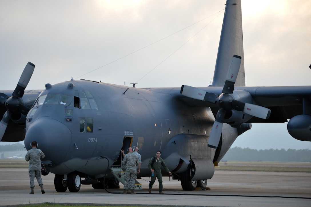 Airmen offload from a HC-130 Hercules aircraft after landing at the Trent Lott Combat Readiness Training Center during Southern Strike 16 in Gulfport, Miss., Nov. 5, 2015. New York Air National Guard photo by Staff Sgt. Christopher S. Muncy.