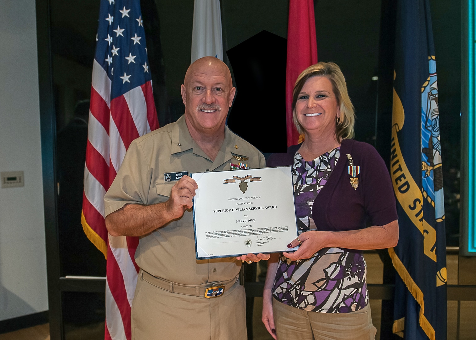 Mary Jo Dust earned the Superior Civilian Service Award for her work while deployed to Camp Arifjan, Kuwait in support of Operation Inherent Resolve. She was recognized by Navy Rear Adm. John King’s at his DLA Land and Maritime’s commander’s Town Hall Oct. 21.