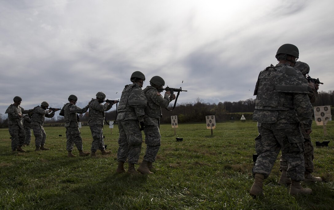 U.S. Army Reserve Soldiers from military police and drill sergeant units fire their rifles at a qualification range during a multi-day training event hosted at Camp Atterbury, Ind., Nov. 6. The 384th Military Police Battalion, headquartered at Fort Wayne, Ind., organized a three-day range and field training exercise involving more than 550 U.S. Army Reserve Soldiers and incorporated eight different weapons systems, combat patrolling and a rifle marksmanship competition at Camp Atterbury, Ind., Nov. 5-7. (U.S. Army photo by Master Sgt. Michel Sauret)