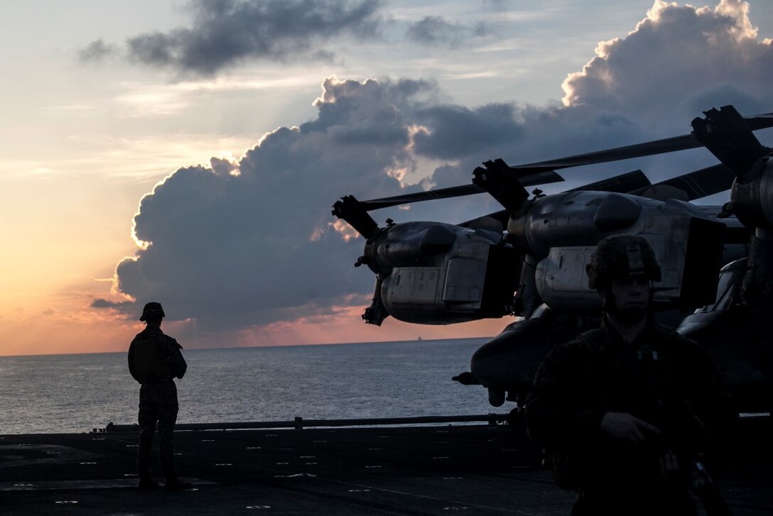 INDIAN OCEAN (Nov. 4, 2015) U.S. Marines and Sailors with the 15th Marine Expeditionary Unit provide security during a mass casualty drill on the flight deck of the USS Essex (LHD 2).The Marines and Sailors honed their skills to become quicker and more efficient should a situation arise where medical attention is needed. The 15th MEU is currently deployed in the Indo-Asia-Pacific region to promote regional stability and security in the U.S. 7th Fleet area of operations. (U.S. Marine Corps photo by Cpl. Elize McKelvey/Released)
