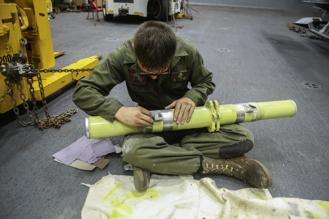 INDIAN OCEAN (Nov. 6, 2015) U.S. Marine Lance Cpl. Jarrett Scoggins preps a horn for a buffer on an aircraft aboard the USS Anchorage (LPD 23). Scoggins is an airframe mechanic with Marine Medium Tiltrotor Squadron 161 (Reinforced), 15th Marine Expeditionary Unit. The 15th MEU is currently deployed in the Indo-Asia-Pacific region to promote regional stability and security in the U.S. 7th Fleet area of operations. (U.S. Marine Corps photo by Sgt. Steve H. Lopez/Released)