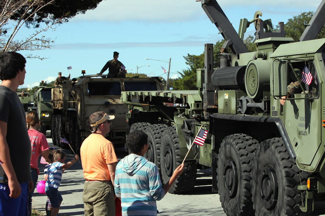 2nd Marine Aircraft Wing and Marine Corps Air Station Cherry Point Marines participate and exhibit their tactical vehicles at the 2015 Carteret County Veteran’s Day Parade in Morehead City, N.C., Oct. 7, 2015. The parade was a chance for the public and armed forces to show their appreciation to the veterans and active duty military of Cherry Point. (U.S. Marine Corps photo by Pfc. Nicholas P. Baird/ Released)