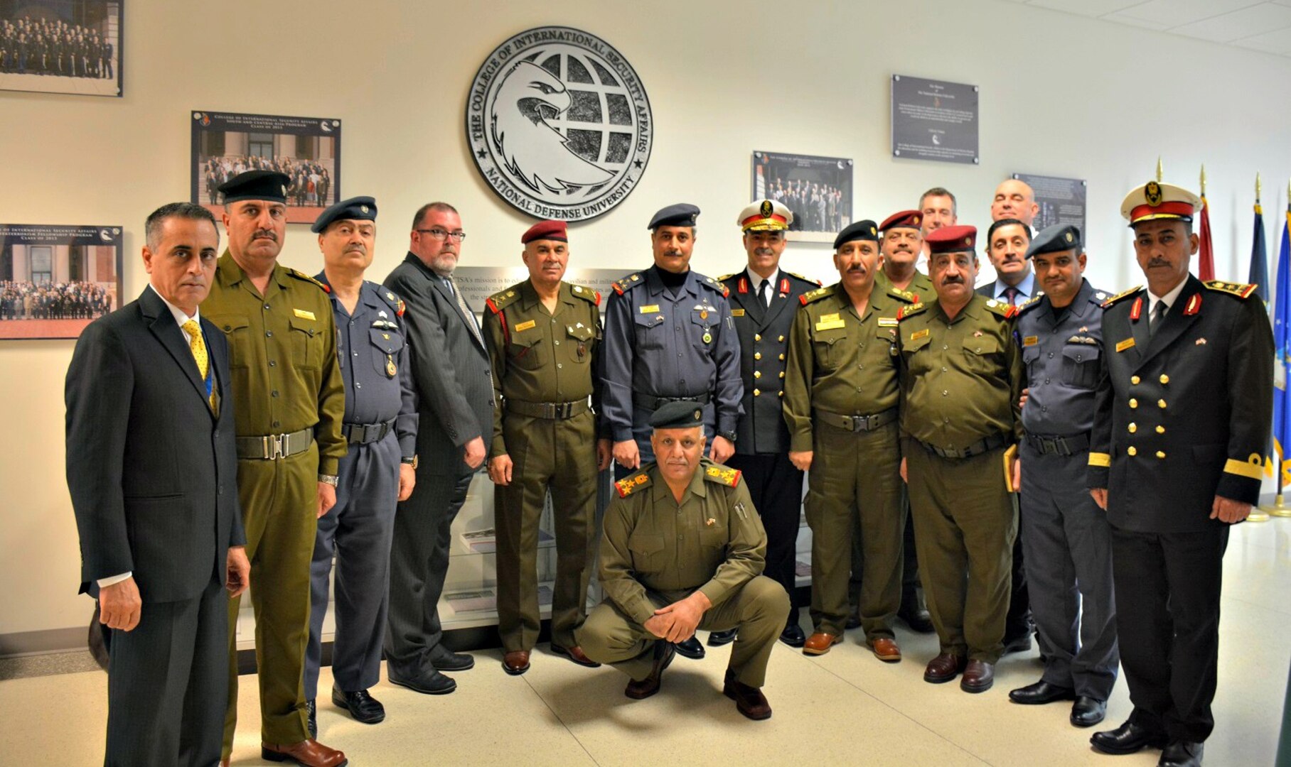 Iraqi Delegation poses in the halls of CISA