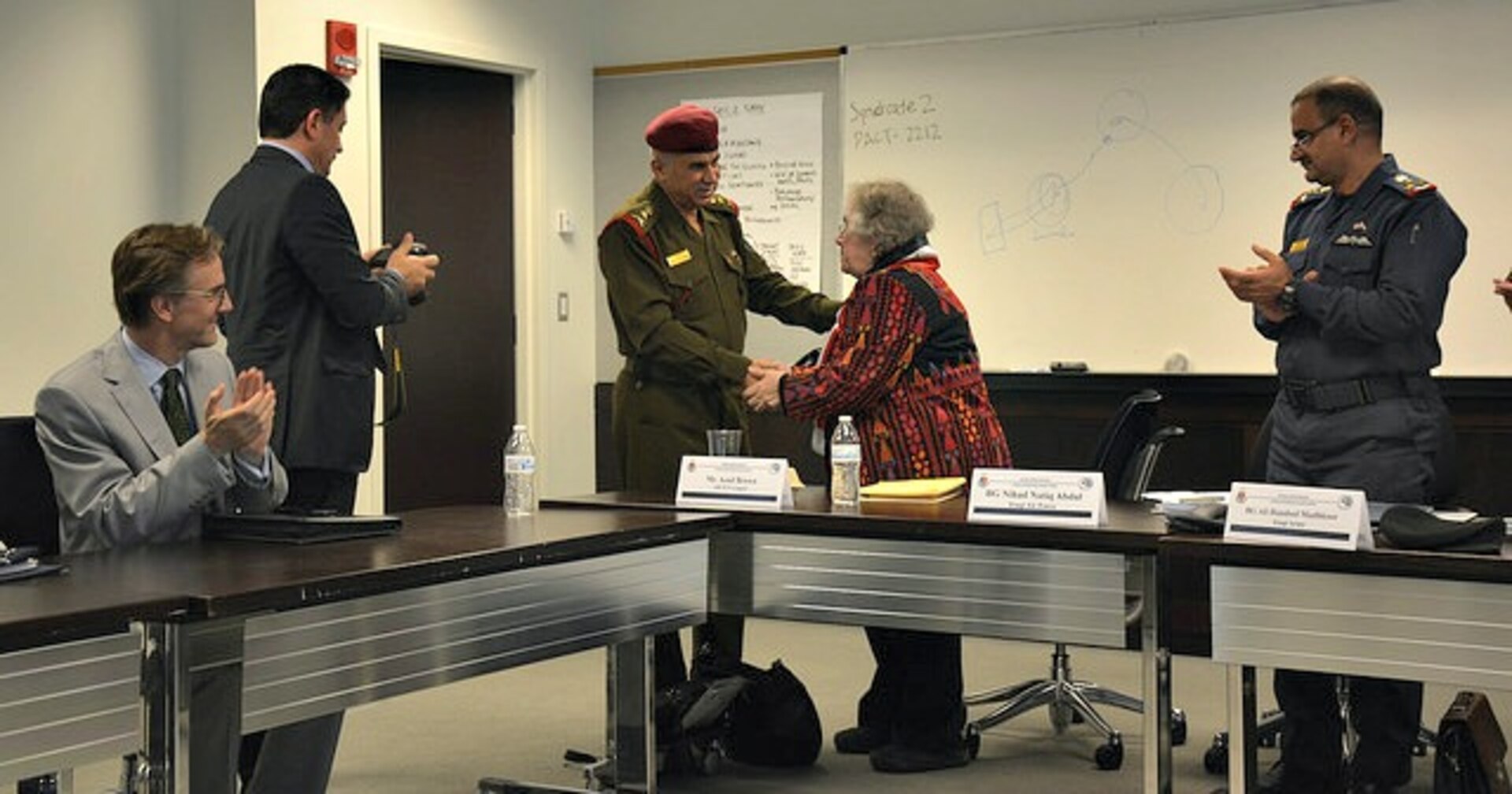 Lt. General Abbas Fezea and NDU Professor Dr. Judith Yaphe following the roundtable discussion