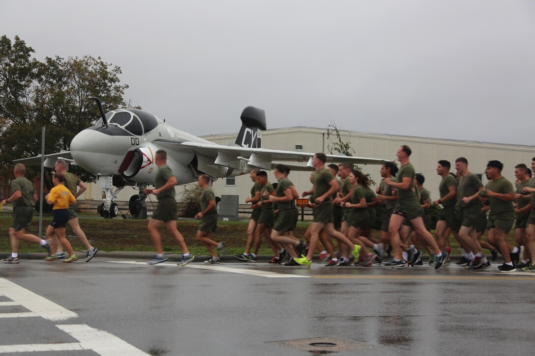 Hundreds of Marines run under cloudy skies during the Marine Corps birthday run at Marine Corps Air Station Cherry Point, N.C., Nov. 9, 2015. More than 1,500 Marines and Sailors with 2nd Marine Aircraft Wing and MCAS Cherry Point participated in the motivational run to commemorate the Marine Corps’ 240th birthday. The run is held annually to celebrate the traditions of the Marine Corps and the camaraderie of the service members. (U.S. Marine Corps photo by Cpl. N.W. Huertas/ Released)