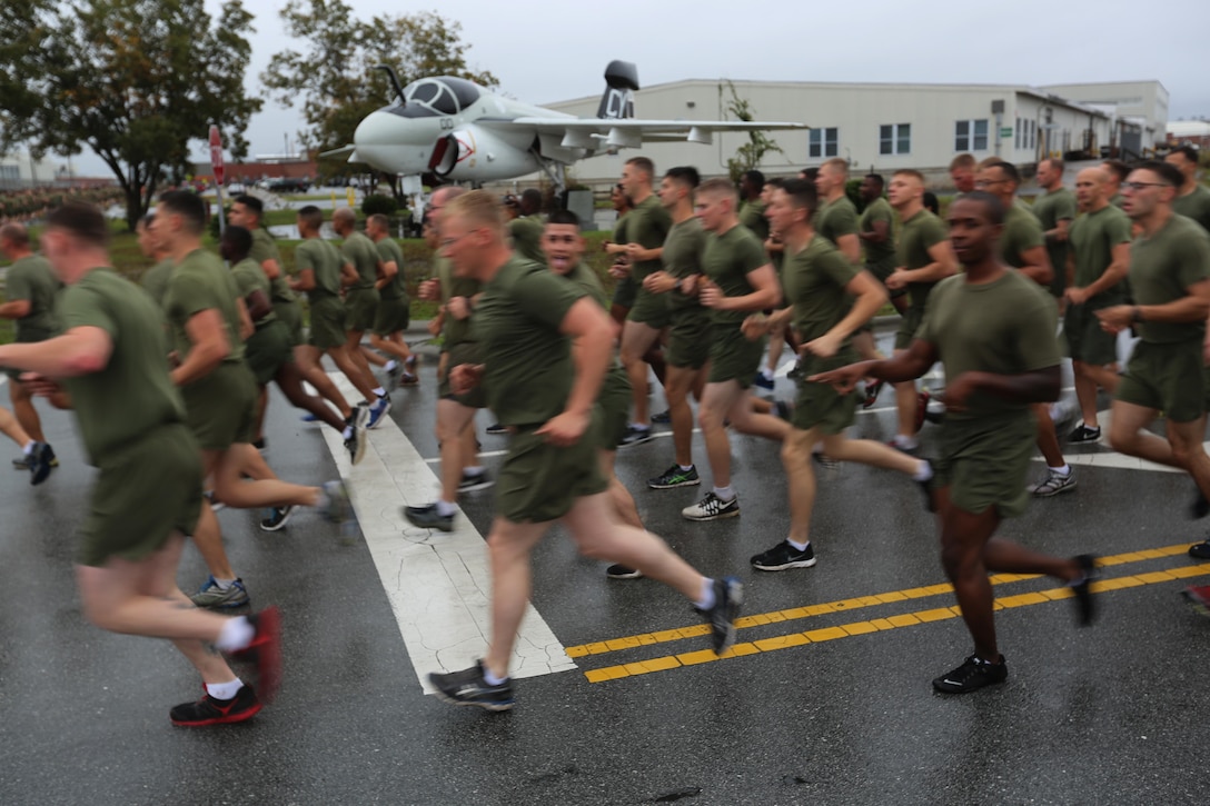 Marines run through the streets during the Marine Corps birthday run at Marine Corps Air Station Cherry Point, N.C., Nov. 9, 2015. More than 1,500 Marines and Sailors with 2nd Marine Aircraft Wing and MCAS Cherry Point participated in the motivational run to commemorate the Marine Corps’ 240th birthday. The run is held annually to celebrate the traditions of the Marine Corps and the camaraderie of the service members. (U.S. Marine Corps photo by Cpl. N.W. Huertas/ Released)