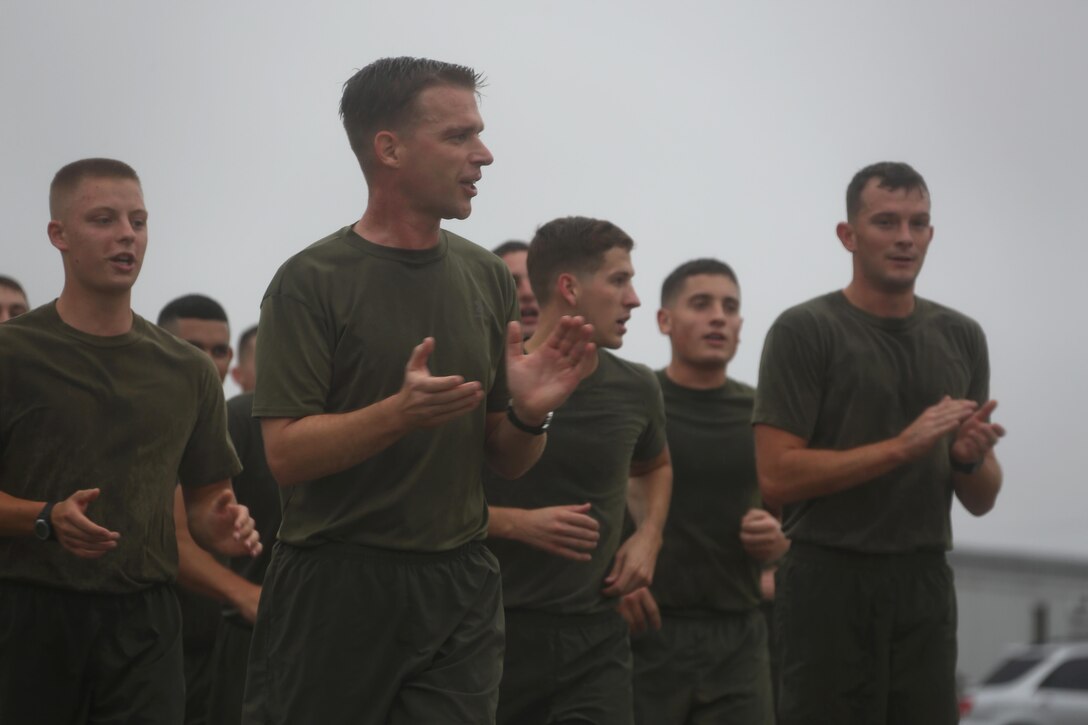 Marines with Marine Transport Squadron 1 sing cadences during the Marine Corps birthday run at Marine Corps Air Station Cherry Point, N.C., Nov. 9, 2015. More than 1,500 Marines and Sailors with 2nd Marine Aircraft Wing and MCAS Cherry Point participated in the motivational run to commemorate the Marine Corps’ 240th birthday. The run is held annually to celebrate the traditions of the Marine Corps and the camaraderie of the service members. (U.S. Marine Corps photo by Cpl. N.W. Huertas/ Released)
