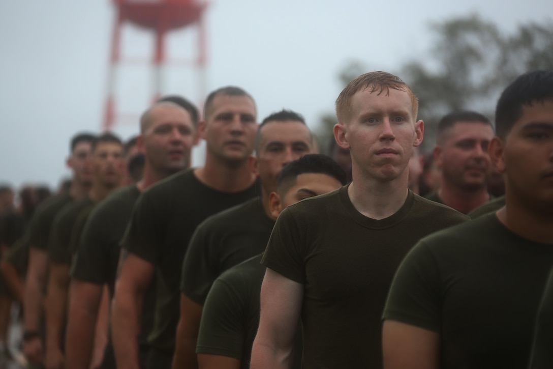 Marines march in a formation through the rain during the Marine Corps birthday run at Marine Corps Air Station Cherry Point, N.C., Nov. 9, 2015. More than 1,500 Marines and Sailors with 2nd Marine Aircraft Wing and MCAS Cherry Point participated in the motivational run to commemorate the Marine Corps’ 240th birthday. The run is held annually to celebrate the traditions of the Marine Corps and the camaraderie of the service members. (U.S. Marine Corps photo by Cpl. N.W. Huertas/ Released)