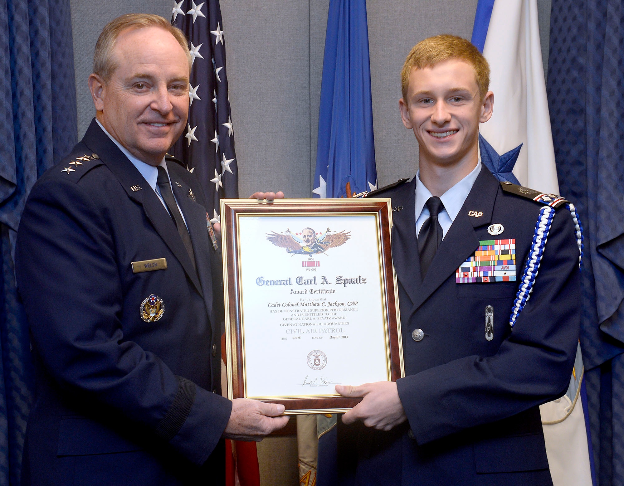 Air Force Chief of Staff Gen. Mark A. Welsh III presents Civil Air Patrol Cadet Matthew C. Jackson the General Carl A. Spaatz Award in the Pentagon, Nov. 9, 2015.  Jackson is the 2,000th recipient of this award, and he serves in the Twin Pine Composite Squadron of the New Jersey Wing, Civil Air Patrol, in West Trenton, N.J.  (U.S. Air Force photo/Scott M. Ash)