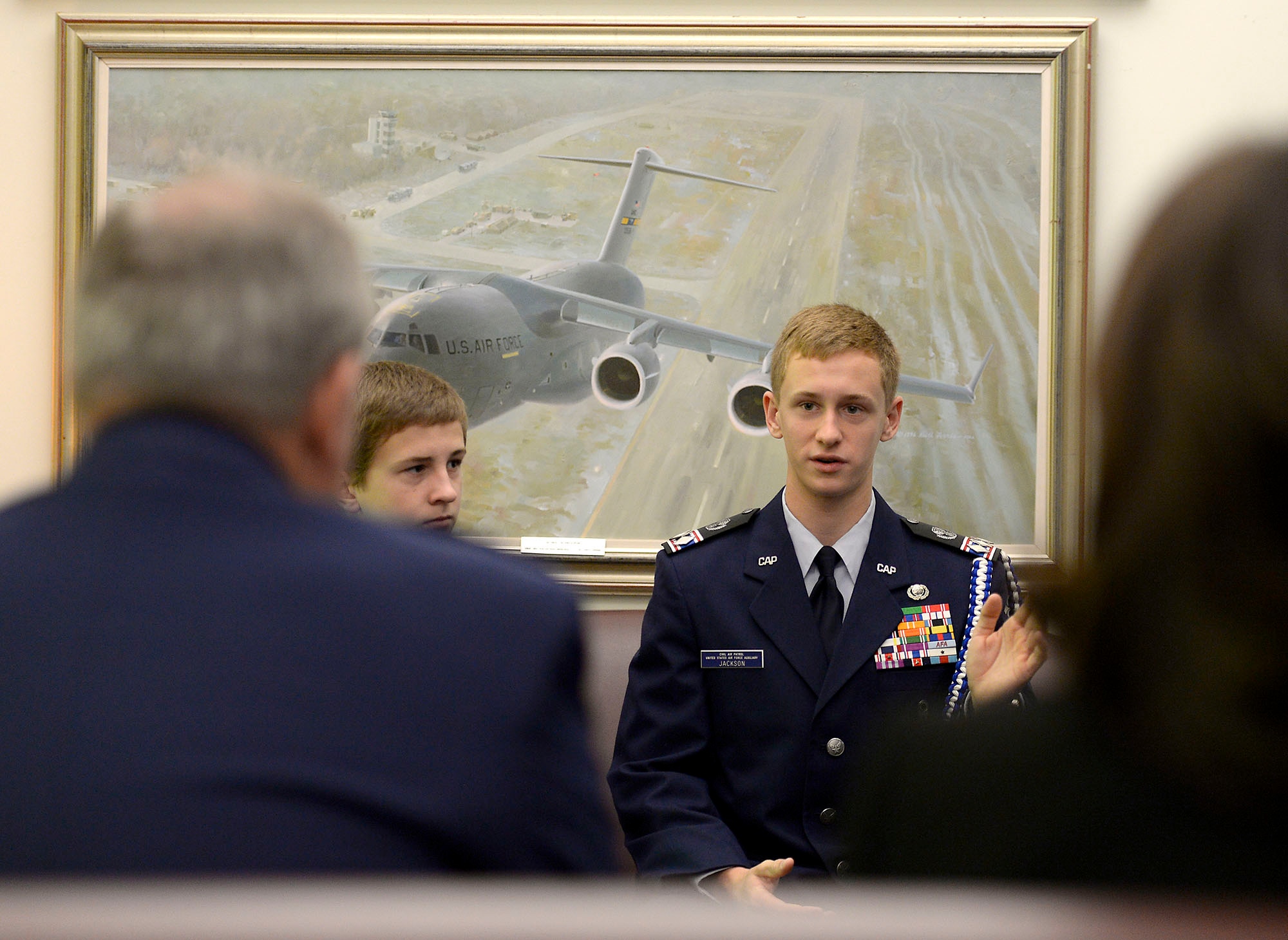Civil Air Patrol Cadet Matthew C. Jackson tells Air Force Chief of Staff Gen. Mark A. Welsh III and his wife, Betty, about his desire to fly aircraft during a visit where he was presented the General Carl A. Spaatz Award in the Pentagon, Nov. 9, 2015. Jackson is the 2,000th recipient of this award, and he serves in the Twin Pine Composite Squadron of the New Jersey Wing, Civil Air Patrol, in West Trenton, N.J.  (U.S. Air Force photo/Scott M. Ash)