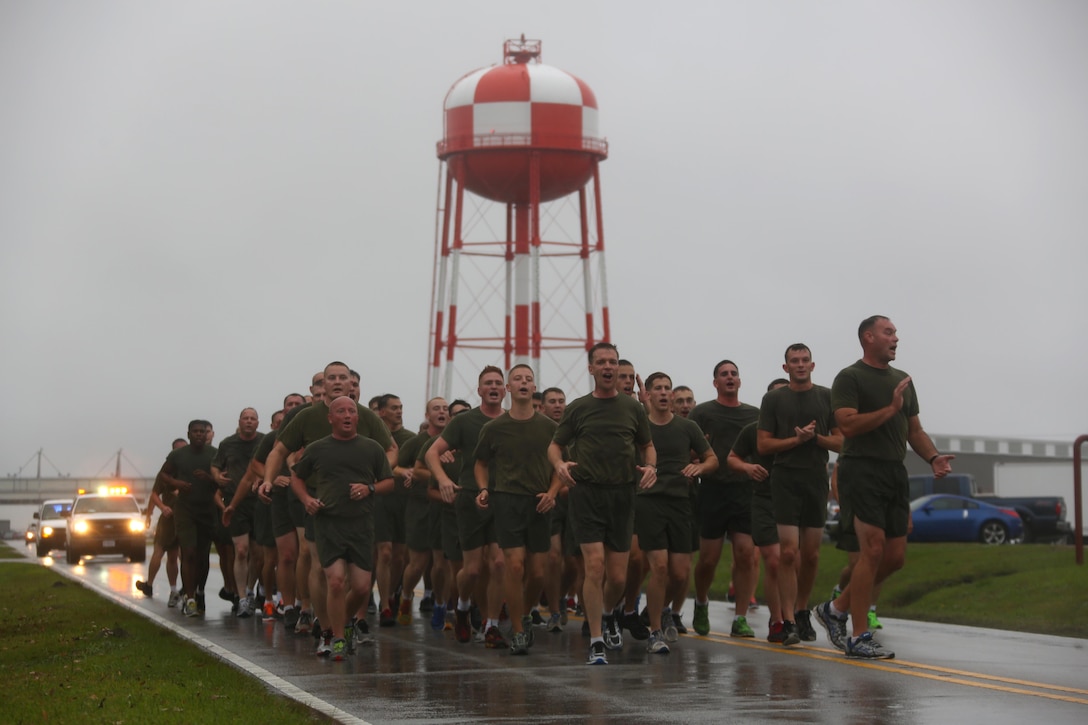 Marines with Marine Transport Squadron 1 sing cadences during the Marine Corps birthday run at Marine Corps Air Station Cherry Point, N.C., Nov. 9, 2015. More than 1,500 Marines and Sailors with 2nd Marine Aircraft Wing and MCAS Cherry Point participated in the motivational run to commemorate the Marine Corps’ 240th birthday. The run is held annually to celebrate the traditions of the Marine Corps and the camaraderie of the service members. (U.S. Marine Corps photo by Cpl. N.W. Huertas/ Released)