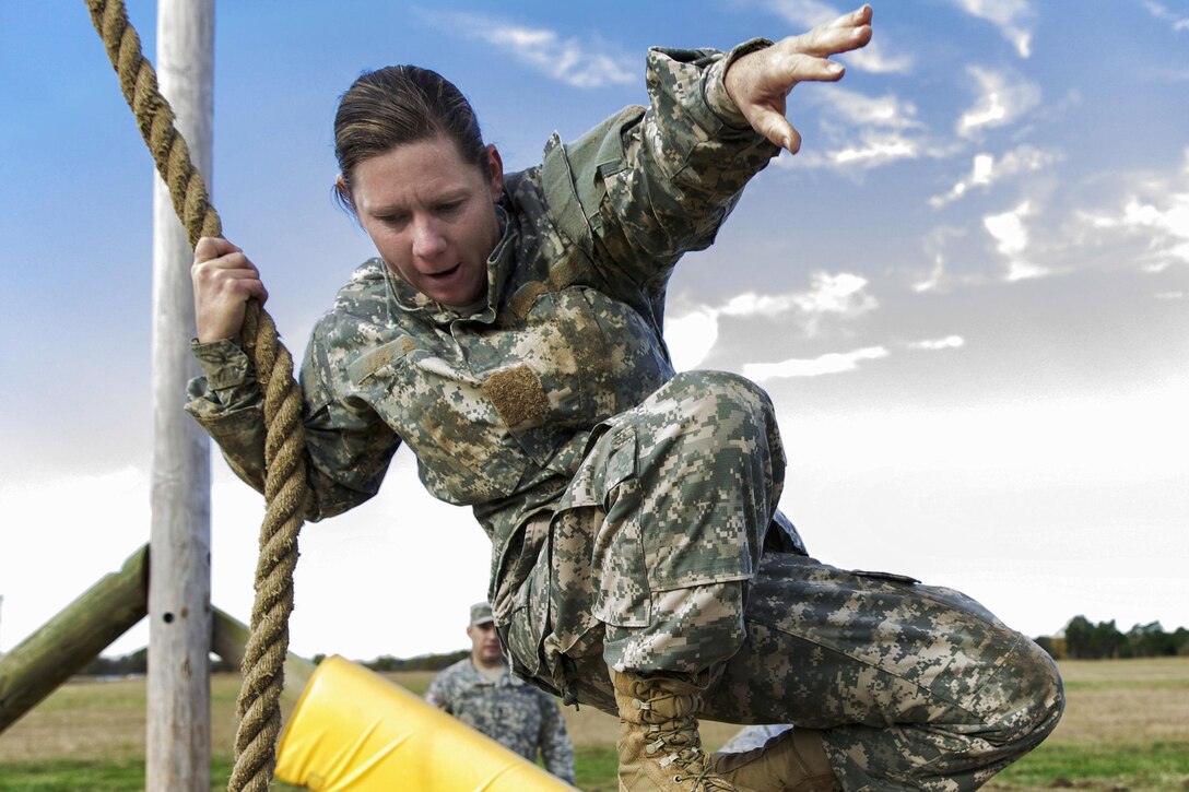 A soldier prepares to negotiate one of the nine stations on an obstacle course during the 2015 Oklahoma Army National Guard Best Warrior Competition on Camp Gruber in Braggs, Okla., Nov. 7, 2015. U.S. Army photo by Sgt. 1st Class Kendall James