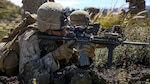 Marines with Kilo Company, 3rd Battalion, 3rd Marine Regiment, provide cover fire for Marines charging a hill during training exercise Lava Viper, a staple of their pre-deployment training, at Range 10 at Pohakuloa Training Area, Hawaii, Nov. 4, 2015. The purpose of the training was to provide Marines within the company with an opportunity to utilize various tactics and weapons while organizing within the platoons to accomplish a common mission. Lava Viper provides the Hawaii-based Marines with an opportunity to conduct various movements, live-fire and tactical training before departing for Integrated Training Exercise aboard Marine Air-Ground Combat Center Twentynine Palms, Calif., where the battalion will train and be evaluated as a whole.